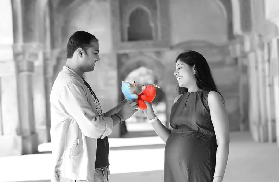 a man giving flower to girl